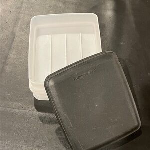 Tupperware Black and White Storage Containers.